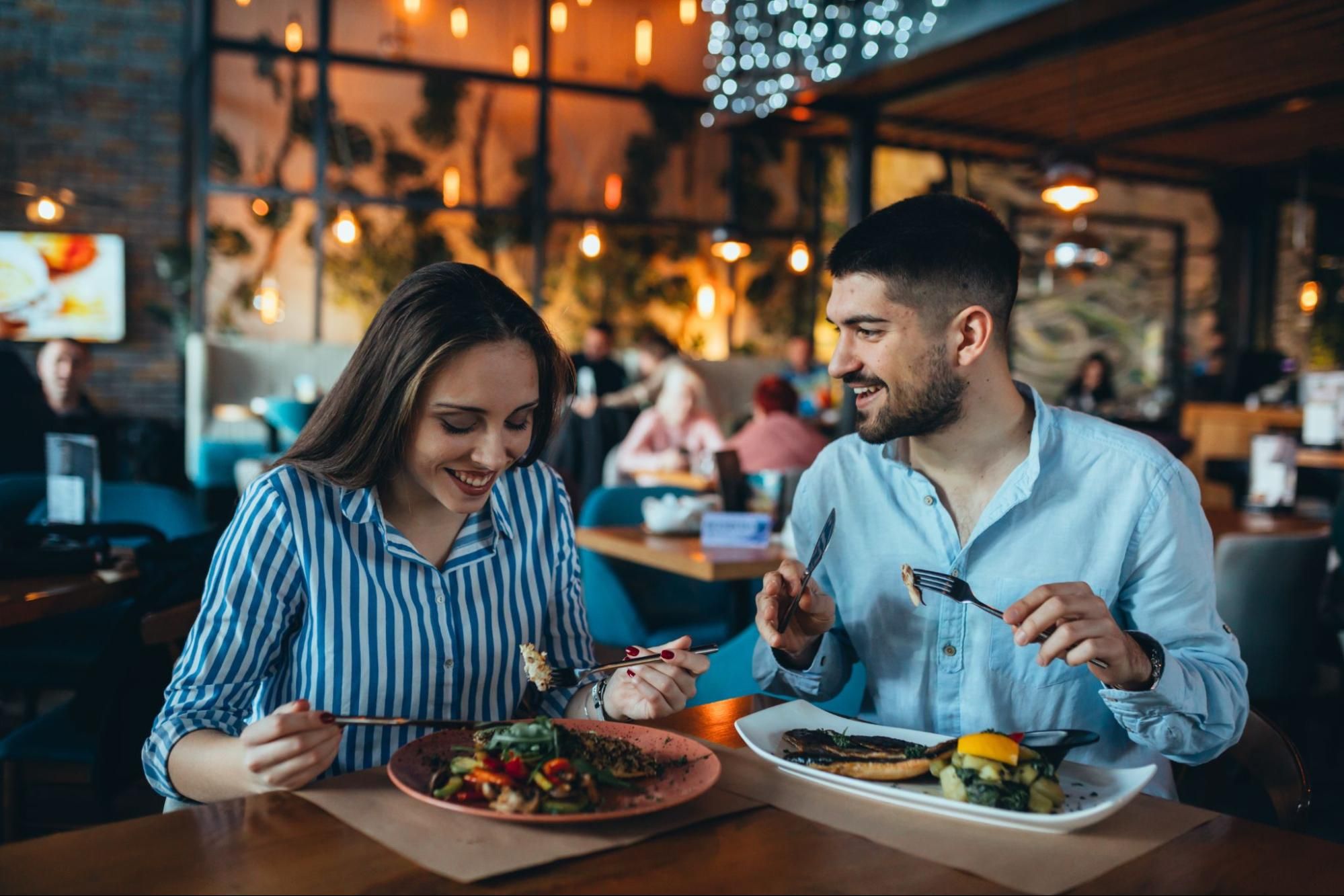 A Couple Sitting at a Logan Circle DC Restaurant Enjoying Their Meal