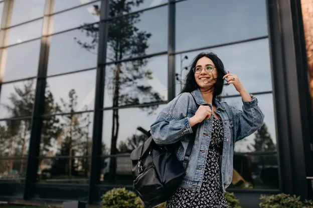 Woman Walking in Front of a Mount Pleasant Building