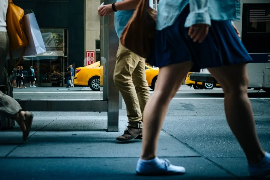 People Walking On A Sidewalk In DC