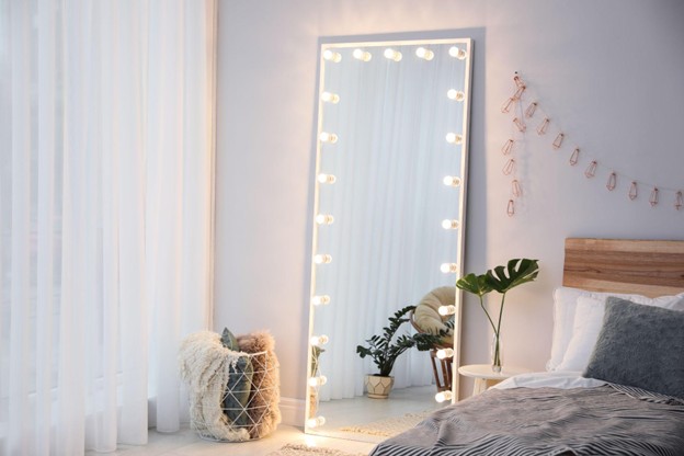 Low Bed With Tall Floor Mirror