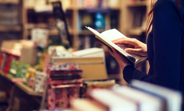 Woman Reading a Book in a Georgetown DC Bookstore