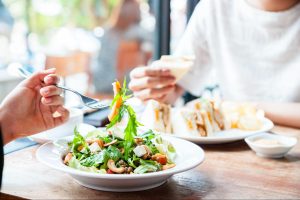 Couple Eating a Salad and Sandwich in Dupont Circle, Washington DC